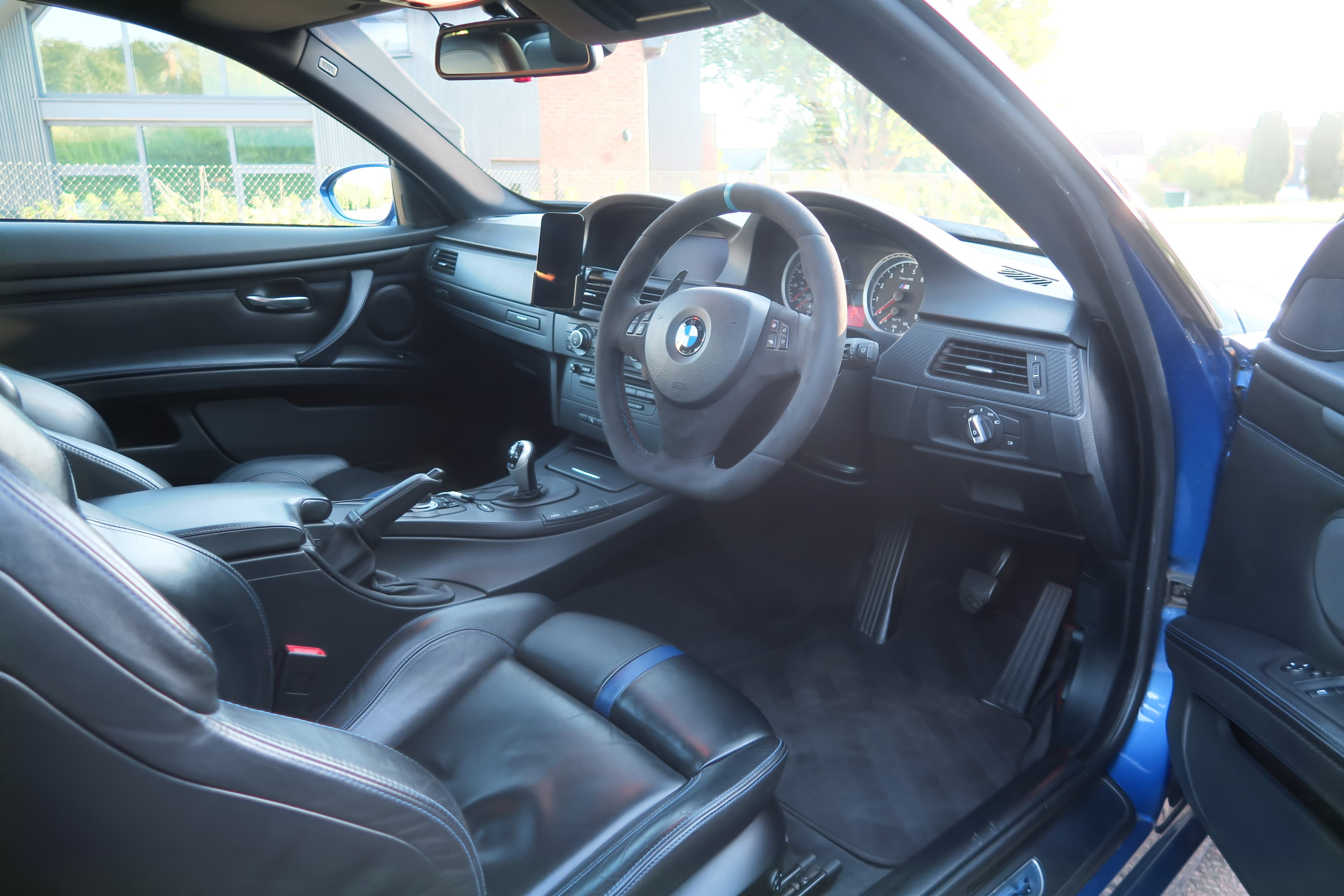 BMW M3 cabin with leather seats and steering wheel